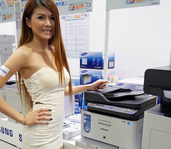 Woman With Laser Printer